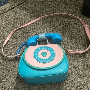 Purse with usable phone